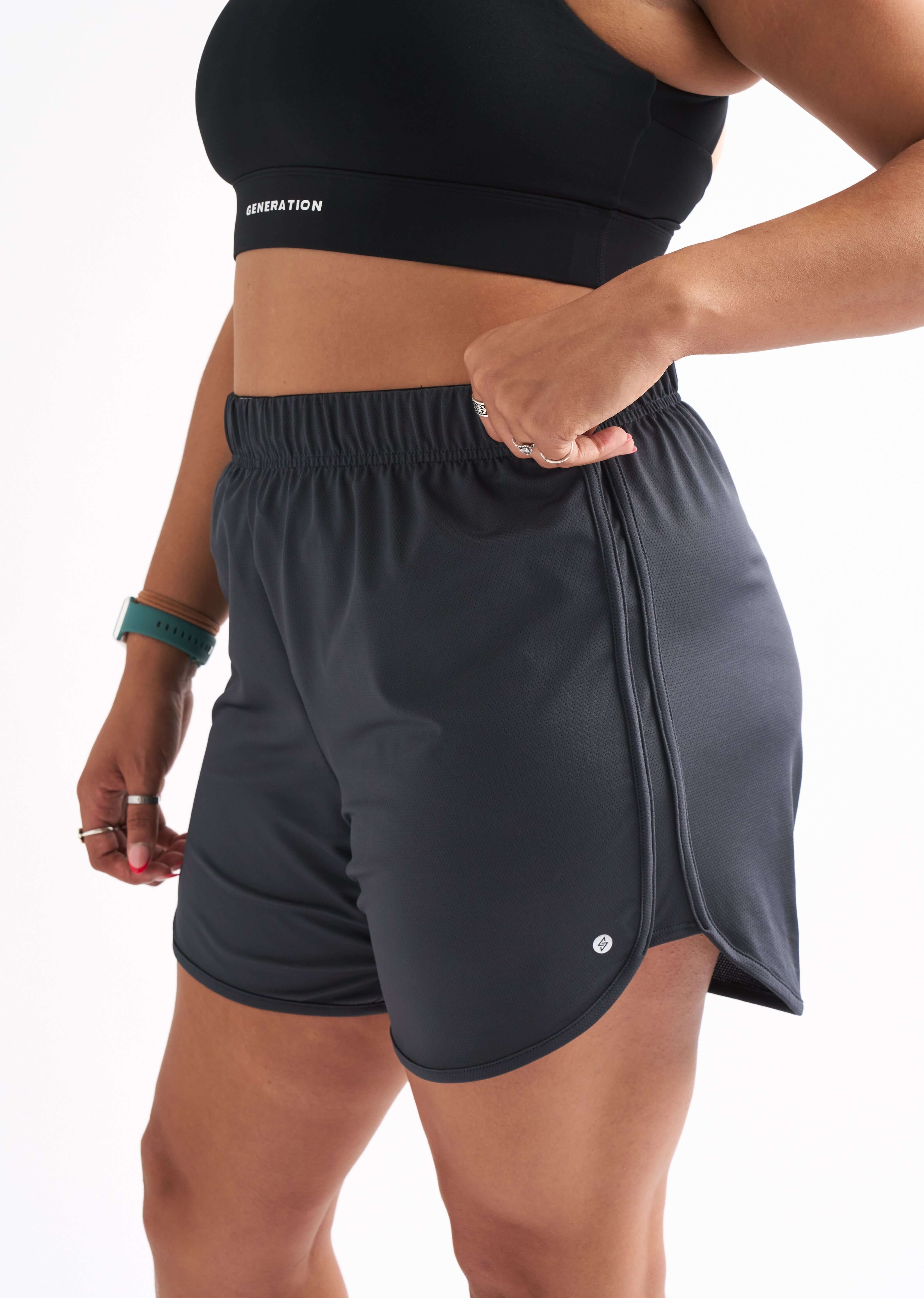 Side view of Locked In running shorts with foldable waistband and breathable fabric designed for comfort.
