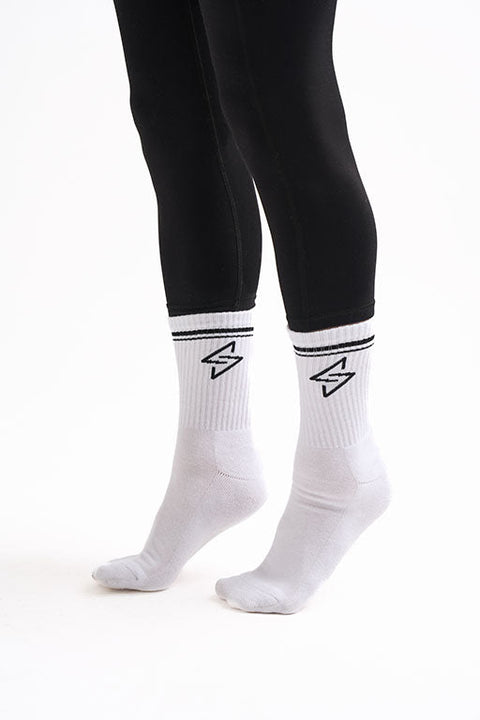 White crew socks with retro red and blue stripe detailing, laid flat with Generation Sport logo visible on the ankle.